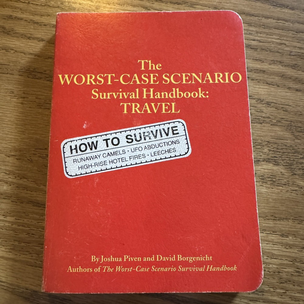 The Worst Case Scenario Survival Handbook: Travel (Paperback Book Red Cover)